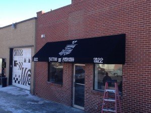 Custom Painted Awnings for Denver Tattoo Artists