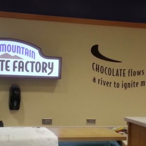 Interior lighted sign and wall vinyl sign installed in Denver, CO